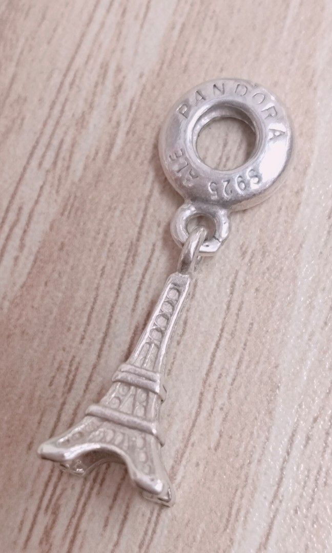 Pandora Eiffel Tower Sterling Silver Charm - Paris Memories (Category: Charms) located in Manila. Submitted by thesilvercloset25 (Listing ID 1434867767, Image 3). Description: ✨ Pandora Eiffel Tower Sterling Silver Charm – Paris Memories ✨ Authentic Pandora charm inspired by the iconic Eiffel Tower 🇫🇷 Perfect for travel lovers and collectors! • Material: Sterling Silver (S925) • Condition: Pre-owned, well kept • Design: Eiffel Tower / Paris the