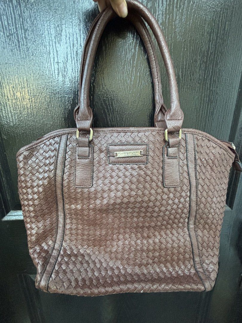Paris Hilton Brown Tote bag (Category: Luxury Bags & Wallets) located in Manila. Submitted by happyeight (Listing ID 1434910818, Image 1). Description: Paris Hilton Brown Tote Bag - Woven design - Rich brown color - Spacious interior - Stylish and practical.