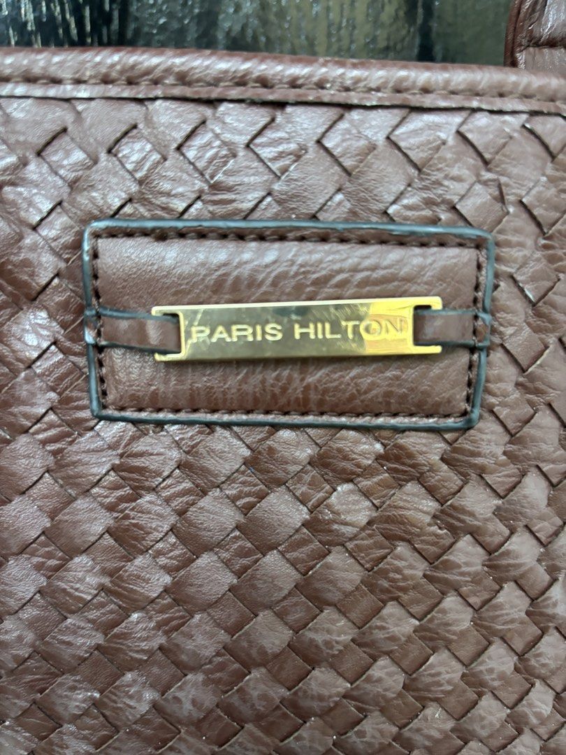 Paris Hilton Brown Tote bag (Category: Luxury Bags & Wallets) located in Manila. Submitted by happyeight (Listing ID 1434910818, Image 3). Description: Paris Hilton Brown Tote Bag - Woven design - Rich brown color - Spacious interior - Stylish and practical.