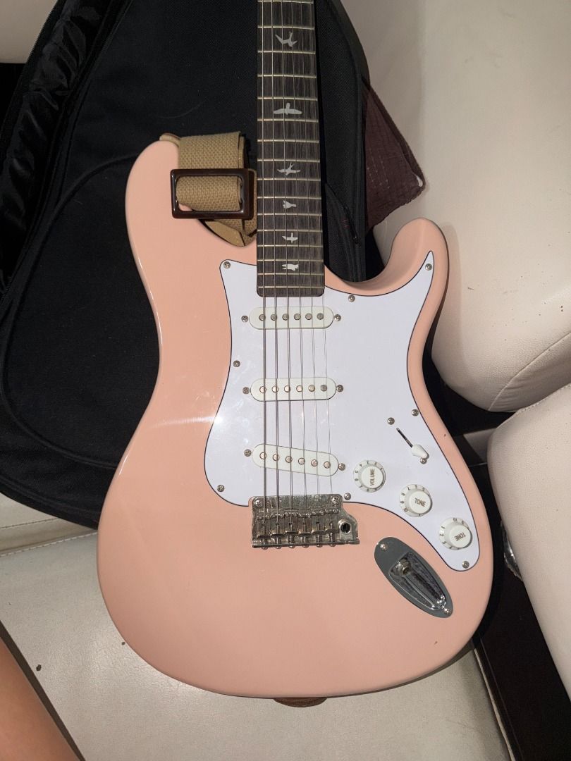 Pink Electric Guitar, Strap, and Amplifier (Starter pack) (Category: Musical Instruments) located in Paranaque City. Submitted by seaweedbrainnss (Listing ID 1434815154, Image 3). Description: -RJ Guitars Basic Electrics - Skycaster Electric Guitar (Stratocaster) = ₱5,499 - RJ Basics Electric Guitar Amplifier - 15 Watts = ₱2,499 - Taylor TaylorWare GS Mini Guitar Strap - Tan = ₱1640 TOTAL = PHP 9639 Used for a few music lessons, no flaws..