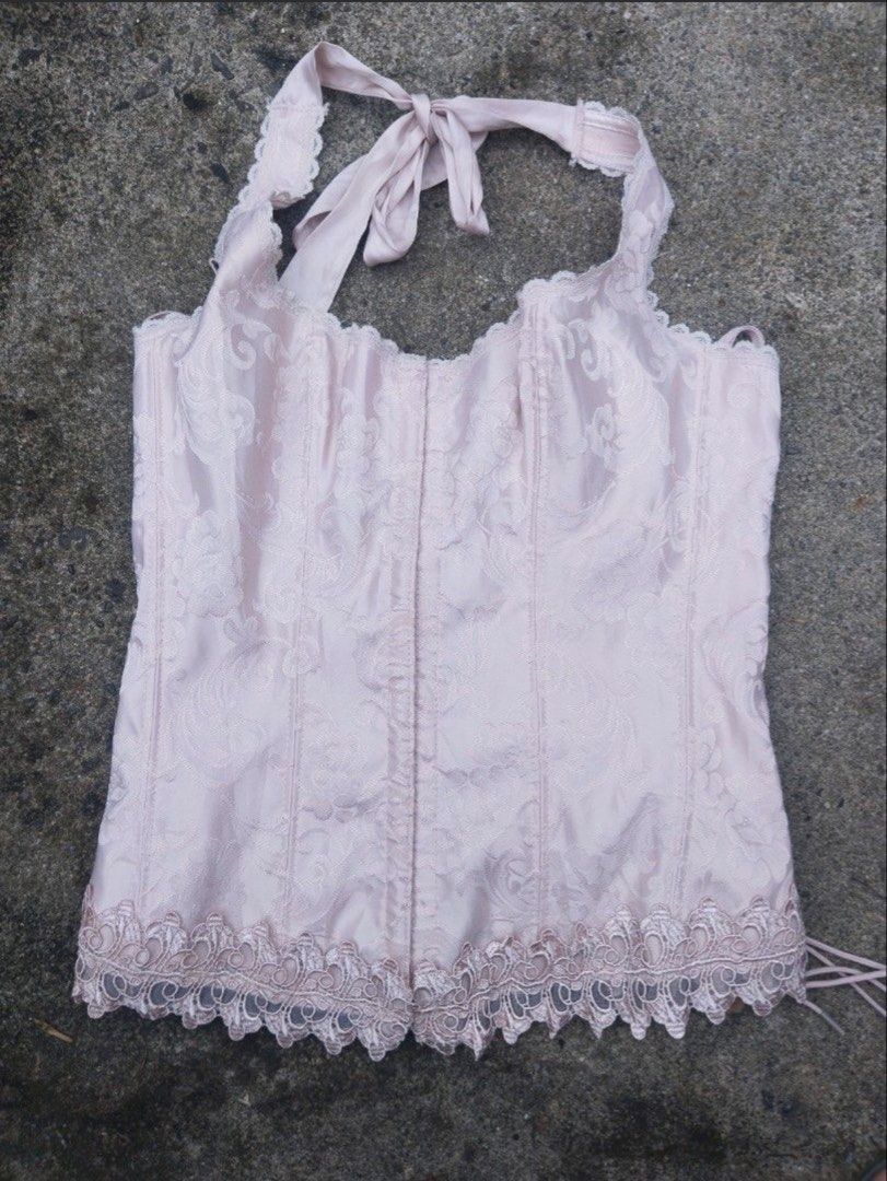 Pink Halter Corset Top (Category: Sleeveless) located in Pasig City. Submitted by shopcz (Listing ID 1434955574, Image 1). Description: - Elegant pink corset top - Halter neck design - Delicate lace trim - Tie closure at the back - Front hook closure - Perfect for special occasions or vintage looks.
