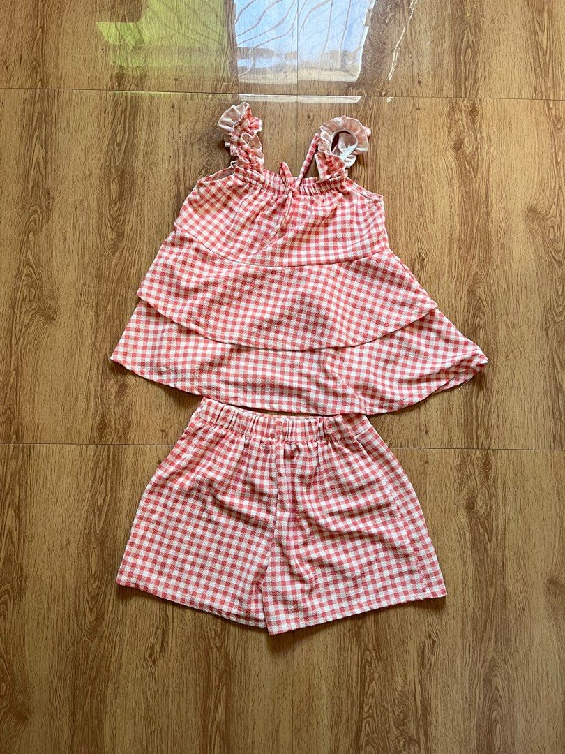 Plaid Gingham Co-ord Set (Category: Sets or Coordinates) located in Dagupan City. Submitted by xincr (Listing ID 1434869186, Image 1). Description: •Ruffled Sleeveless Top - Length: 16 in. - Width: 13 in. - Condition: 10/10 - Flaws: None •Garterized Shorts - Waist: 21 in. - Length: 12 in. - Leg Hole: 9 in. - Flaws: None - All in good condition. Price: 250 + FREE SHIPPING (SET).