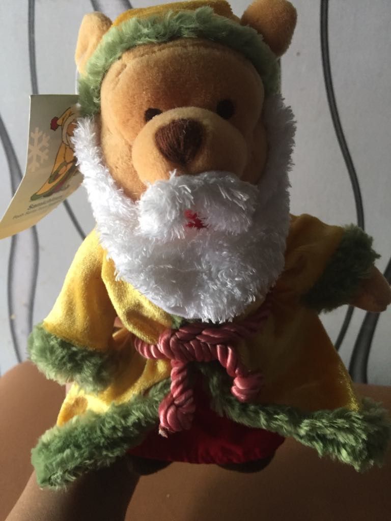 Pooh Santa from Switzerland (Category: Plushies & Soft Toys) located in Antipolo. Submitted by gclassy (Listing ID 1434994128, Image 2). Description: good condition rfs decluttering.