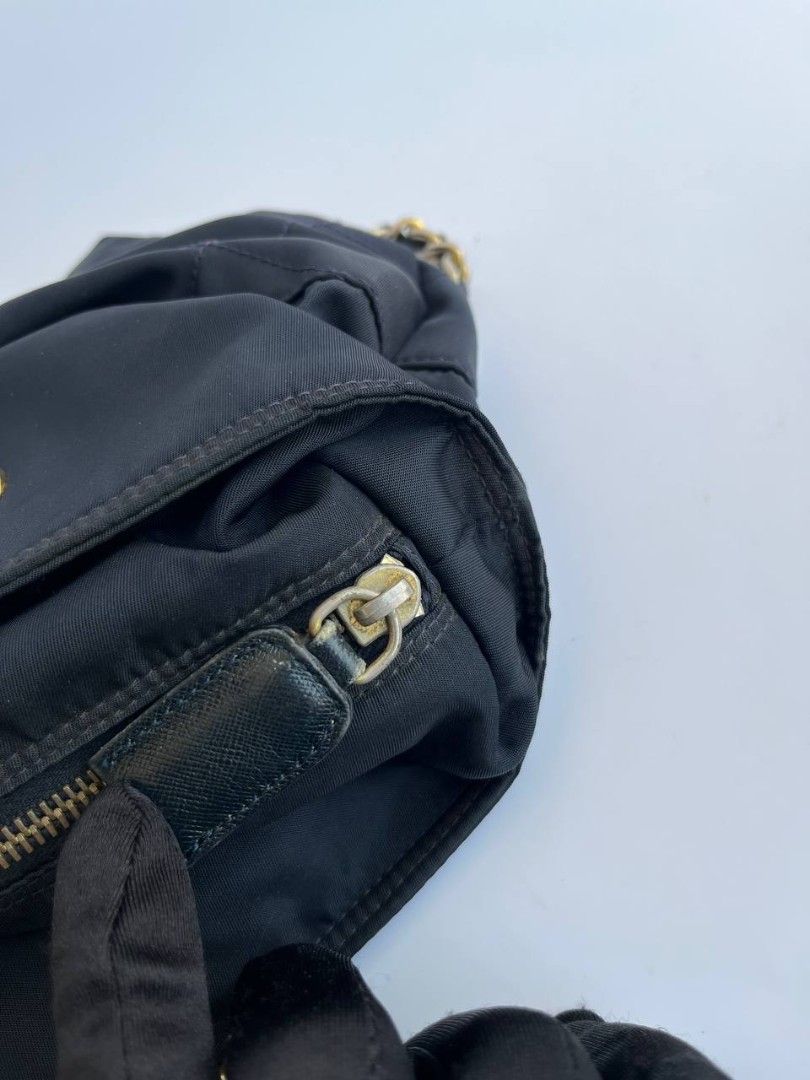 Prada Quilted Nylon Chain Shoulder Bag (Category: Luxury Bags & Wallets) located in Quezon City. Submitted by cornelle_luxuryph (Listing ID 1434948236, Image 3). Description: Prada Quilted Nylon Chain Shoulder Bag Gold-tone chain straps Condition: 8.5-9/10 Very Good, signs of use, tarnishing on the hardware Price: 19,800 pesos only (plus optional legitgrails certificate for 1,300 pesos) 100% authentic | Money back guarantee.