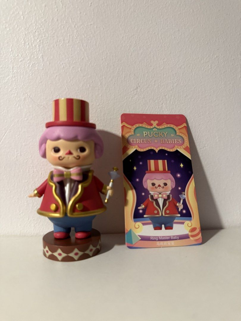 Pucky Circus Babies Ring Master Baby Figure (Category: Designer & Blind Box Toys) located in Manila. Submitted by chombyyy (Listing ID 1434910339, Image 1). Description: - Pucky Circus Babies Ring Master Baby figure - Features Ring Master design - No box.