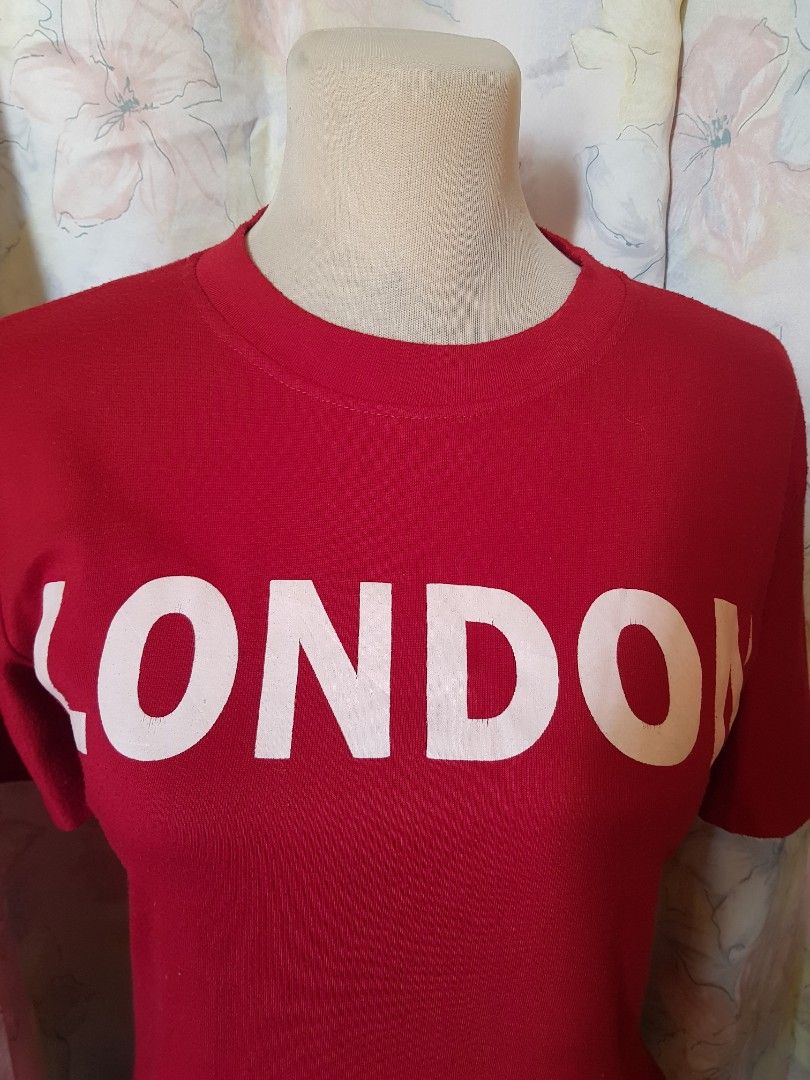 Red London T-shirt (Category: Tshirts & Polo Shirts ) located in Taguig. Submitted by ymicloset (Listing ID 1434881517, Image 2). Description: - Red t-shirt - White "LONDON" print - Short sleeves - Crew neck - Lightweight fabric - Everyday wear.