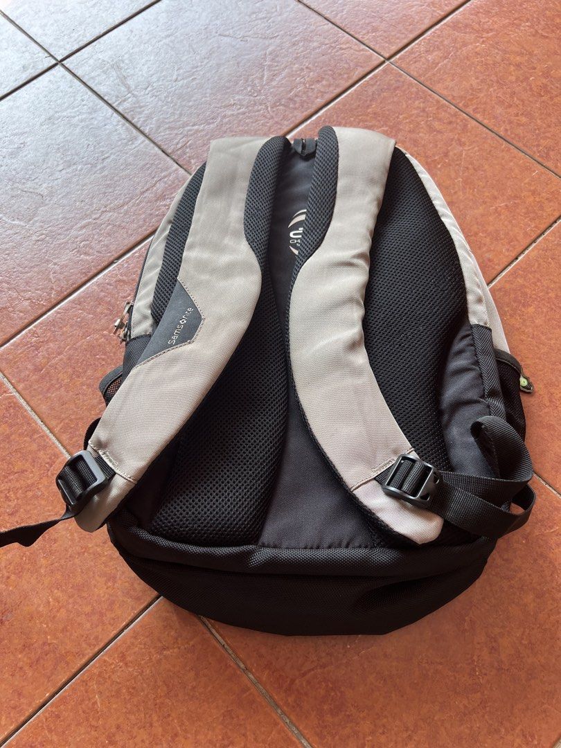 Samsonite Backpack (Category: Backpacks) located in Kuala Lumpur. Submitted by natnat0508 (Listing ID 1434910461, Image 3). Description: - Samsonite backpack - Multiple compartments and pockets - Padded back and shoulder straps - Top handle - Side pockets - Separate interior compartment - some zips are broken so have to use keychain to attach to open and close.