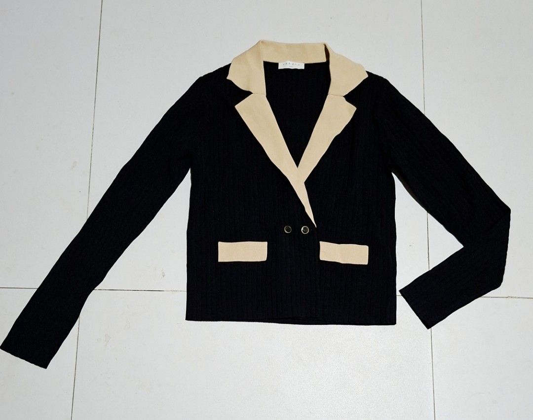 Sandro Cropped Cardigan with Contrasting Collar (Category: Luxury Apparel) located in Koronadal. Submitted by jmiles82 (Listing ID 1434891177, Image 2). Description: - Sandro cropped cardigan - Contrasting collar (black body, beige accents) - Features decorative buttons - Long sleeves - Ribbed knit texture - Brand: Sandro .