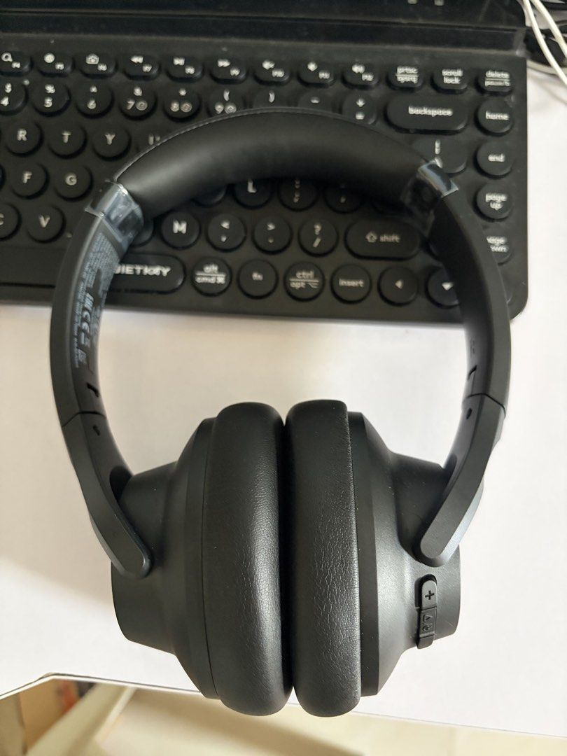 Soundcore Headphones (Category: Headphones & Headsets) located in Angono. Submitted by _jenelyn (Listing ID 1434861938, Image 1). Description: - Soundcore over-ear headphones - Color: Black - Bought 3 weeks ago - Earcups marked with "L" and "R" - Button controls on the right earcup - Padded headband for comfort - Includes a protective pouch.