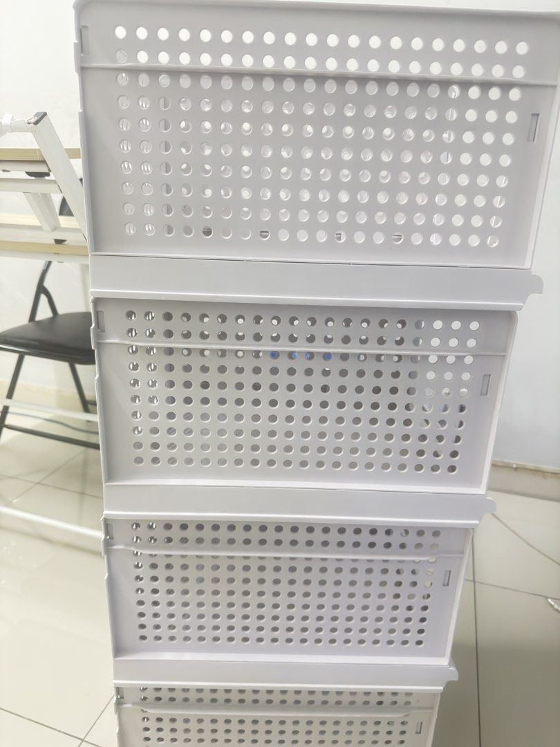 Stackable Storage Baskets (Category: Storage Boxes & Baskets) located in Kuala Lumpur. Submitted by skillful01 (Listing ID 1434850933, Image 3). Description: - Stackable storage baskets - White plastic material - Perforated design for ventilation - Space-saving design - Suitable for home and office use.