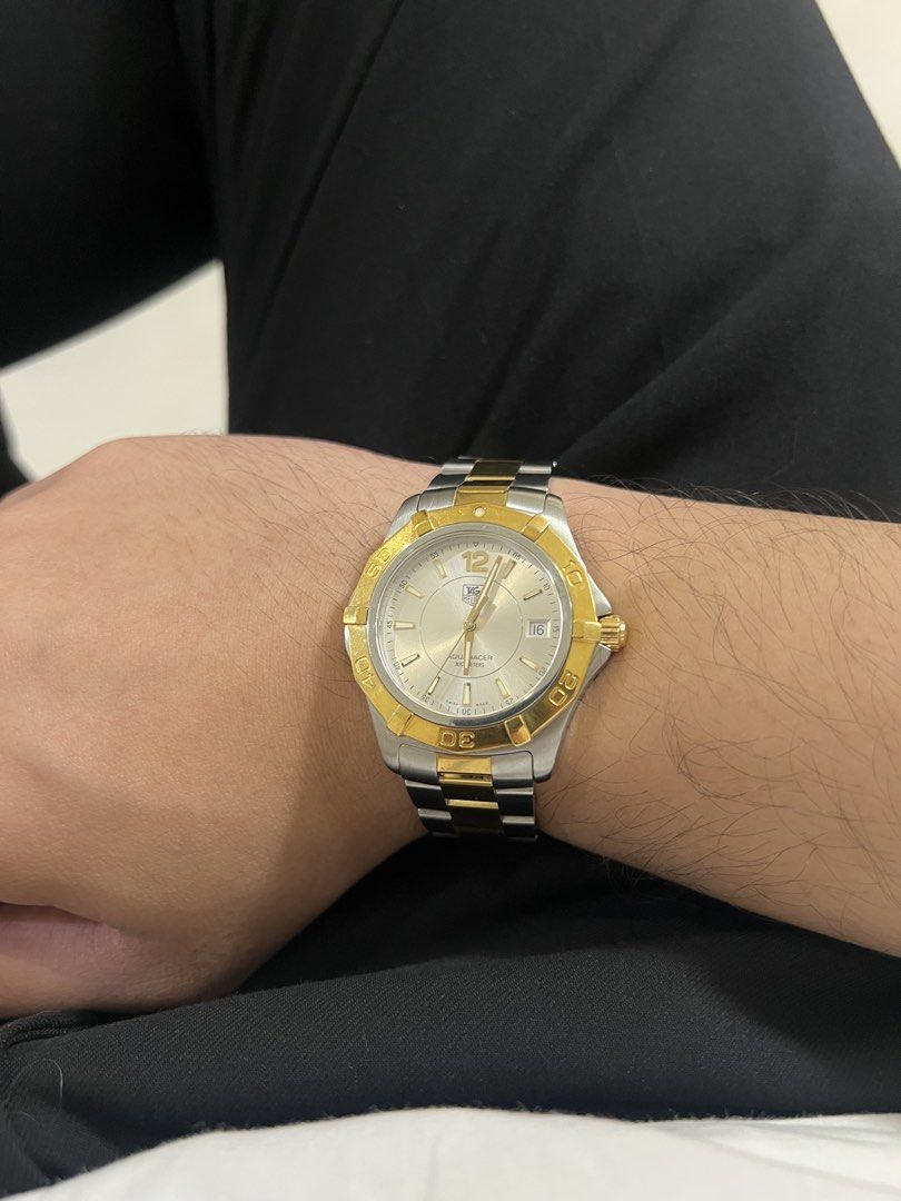 Tag Heuer Aquaracer (Category: Luxury Watches) located in Makati City. Submitted by stevenbravo (Listing ID 1434981474, Image 3). Description: - Tag Heuer Aquaracer - Silver dial with gold-tone accents - Date display - Water-resistant to 300 meters - Model details on case back - Ref: WAF 1120 - Watch only - 41mm case Price: 46,500 Slightly Negotiable! .