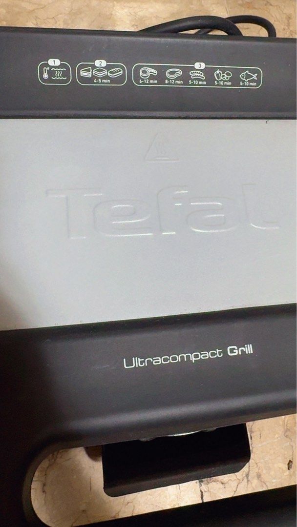 Tefal Ultracompact Grill GC302B26 (Category: BBQ, Grills & Hotpots) located in Las Pinas. Submitted by emdjss (Listing ID 1434866550, Image 1). Description: - Tefal Ultracompact Grill - Non-stick grilling surface - Model: GC302B26 - Made in China - Power: 1700W, 230V~60Hz - Indicator lights for cooking - Compact and easy to store - Perfect for grilling various foods.