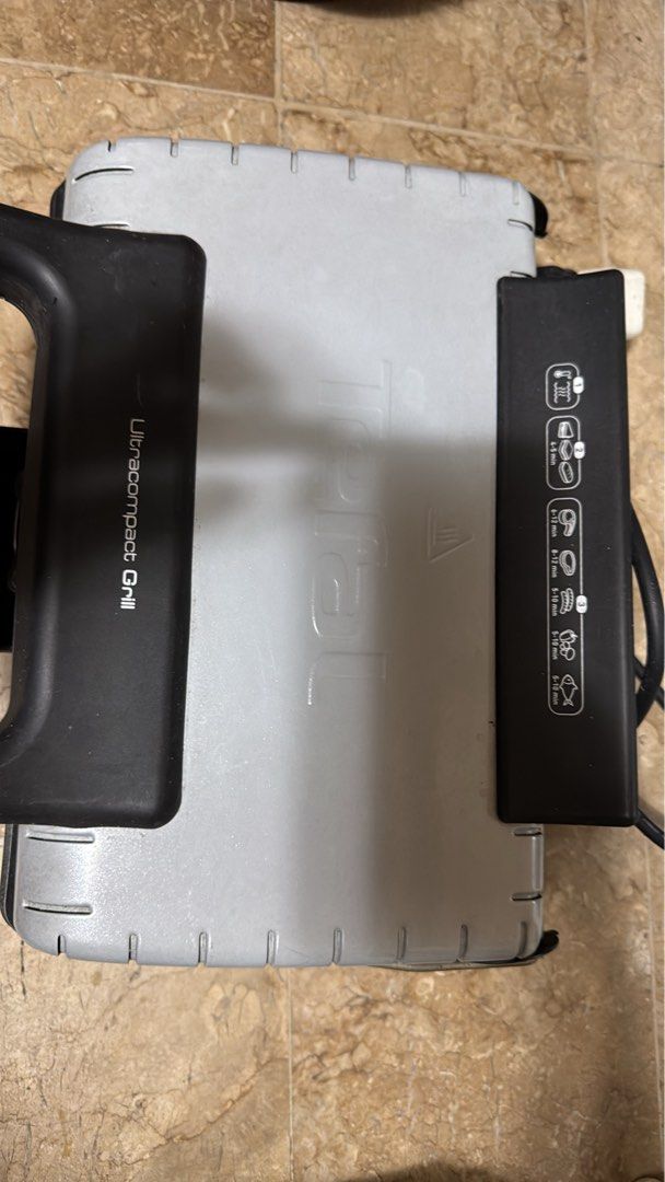 Tefal Ultracompact Grill GC302B26 (Category: BBQ, Grills & Hotpots) located in Las Pinas. Submitted by emdjss (Listing ID 1434866550, Image 2). Description: - Tefal Ultracompact Grill - Non-stick grilling surface - Model: GC302B26 - Made in China - Power: 1700W, 230V~60Hz - Indicator lights for cooking - Compact and easy to store - Perfect for grilling various foods.