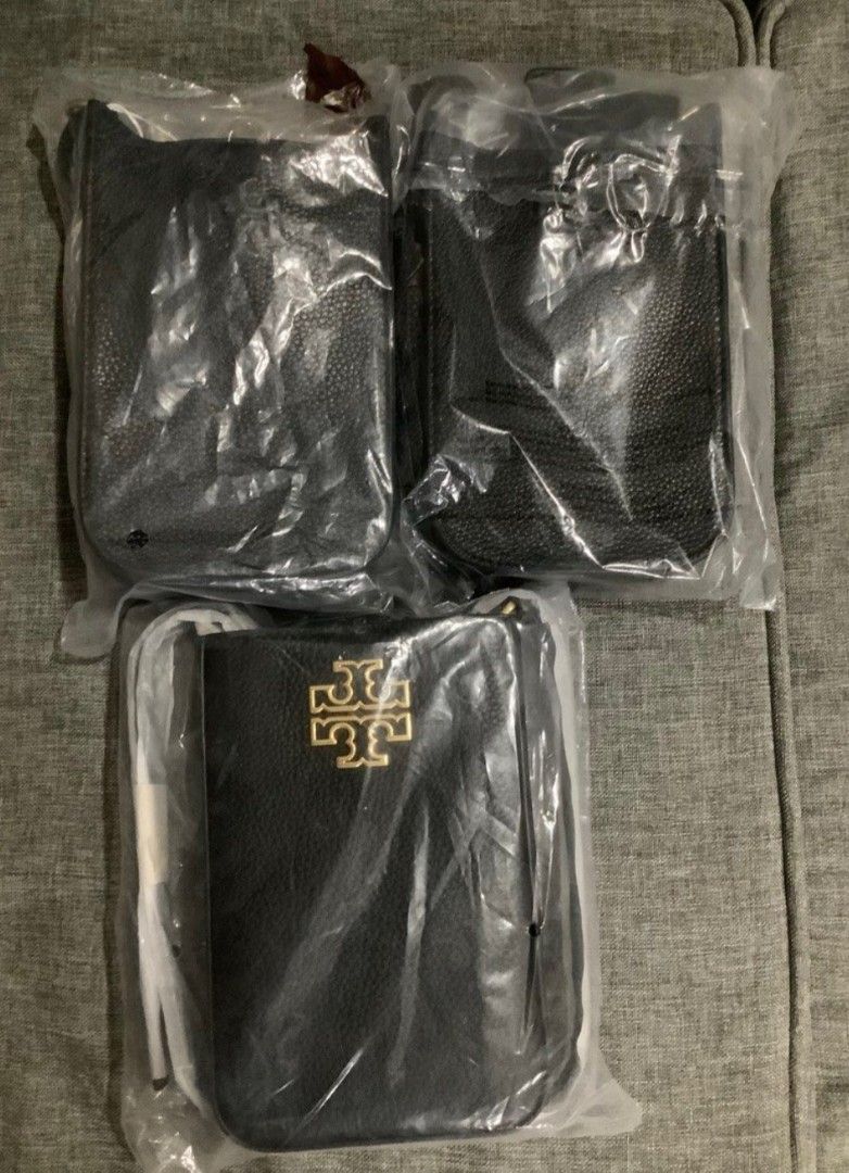 Tory Burch Phone Crossbody Bag (Category: Luxury Bags & Wallets) located in Caloocan City. Submitted by fiercestone-c8e70e (Listing ID 1434866401, Image 3). Description: - Tory Burch phone crossbody bag - Black textured leather - Embossed Tory Burch logo - Detachable crossbody strap - Stylish tassel detail - Multiple compartments for organization - Includes original packaging.