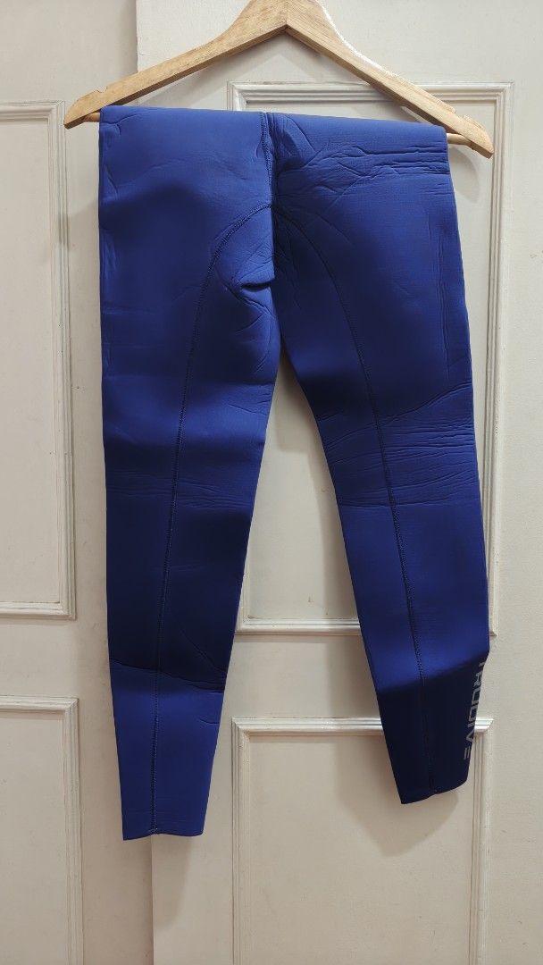 Trudive Wetsuit with Hood and Pants (Category: Rash guard) located in Quezon City. Submitted by trace.abella (Listing ID 1434963872, Image 2). Description: - Trudive wetsuit set reversible - Includes hooded top and pants - Top features Trudive logo and built-in hood - Top color: Blue and black - Pants color: Blue - Designed for diving/water sports - Top includes a crotch strap.
