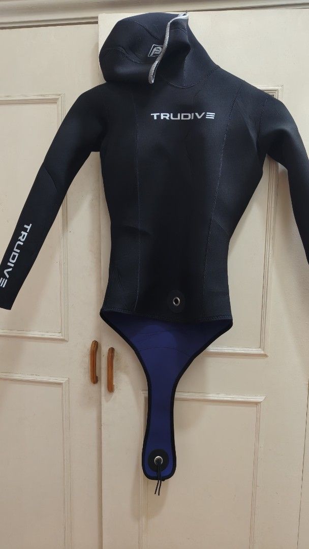 Trudive Wetsuit with Hood and Pants (Category: Rash guard) located in Quezon City. Submitted by trace.abella (Listing ID 1434963872, Image 3). Description: - Trudive wetsuit set reversible - Includes hooded top and pants - Top features Trudive logo and built-in hood - Top color: Blue and black - Pants color: Blue - Designed for diving/water sports - Top includes a crotch strap.
