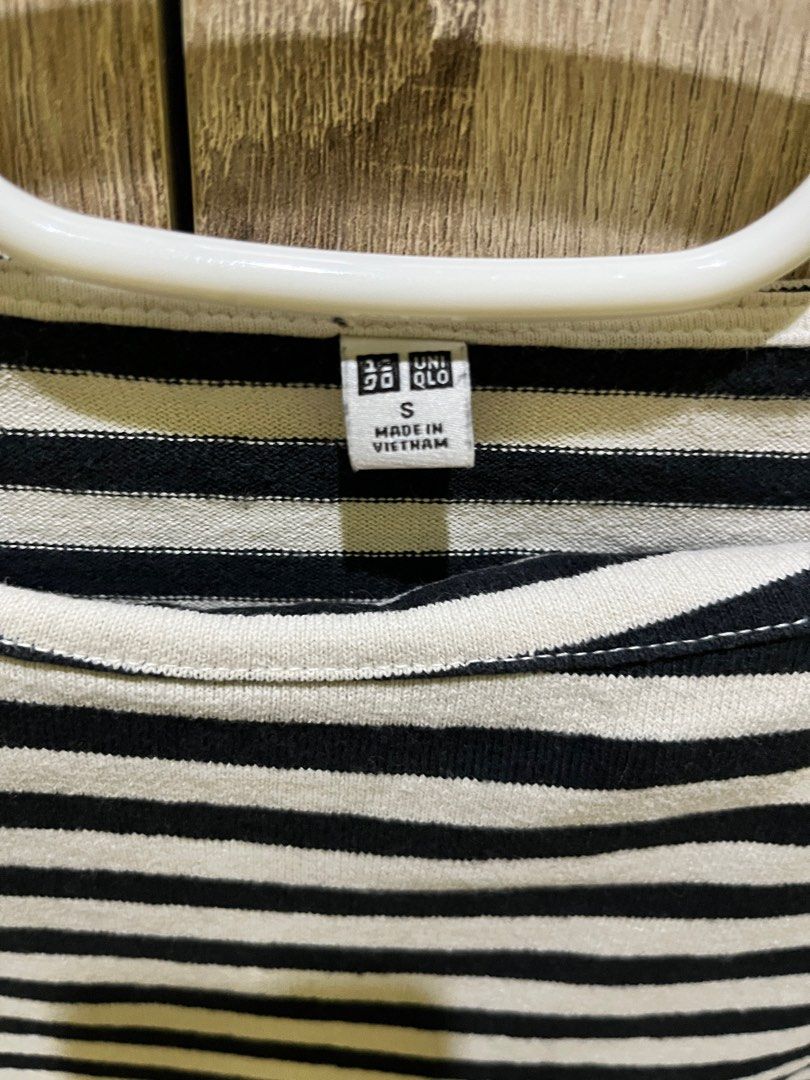 Uniqlo Striped Top - Size S (Category: Blouses) located in Bulacan. Submitted by spring_cleaning_ (Listing ID 1434921037, Image 3). Description: - Uniqlo striped top - Color: Black and white - Size: S - Features: Round neckline, short sleeves - Made in Vietnam - Condition: Good - Classic striped pattern.