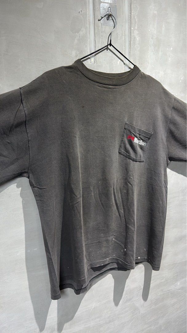 Vintage 90s Marlboro tshirt (Category: Tshirts & Polo Shirts ) located in Manila. Submitted by allinthiswall (Listing ID 1434990585, Image 3). Description: very unsound vintage 90s #marlboro 🚬 west coast collection worn out pocket tee shirt., ft classic marlboro logo, cowboy at tha rear., minimal back cracks,, rear hole, mad wear and fadings all thru out.. boxy 23’ pit by 26.5’ long #allinthiswall 🦋⚡️.