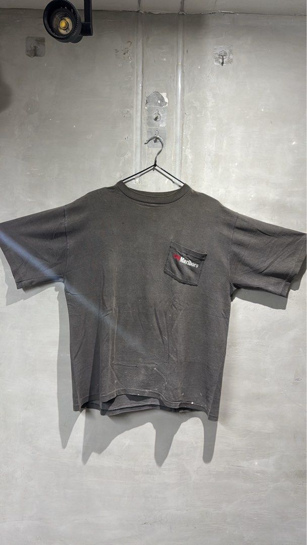 Vintage 90s Marlboro tshirt (Category: Tshirts & Polo Shirts ) located in Manila. Submitted by allinthiswall (Listing ID 1434990585, Image 2). Description: very unsound vintage 90s #marlboro 🚬 west coast collection worn out pocket tee shirt., ft classic marlboro logo, cowboy at tha rear., minimal back cracks,, rear hole, mad wear and fadings all thru out.. boxy 23’ pit by 26.5’ long #allinthiswall 🦋⚡️.