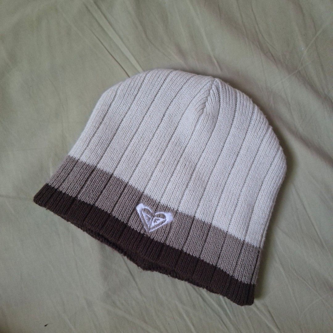 Vintage Quiksilver Acrylic Beanie (Category: Caps & Hats) located in Caloocan City. Submitted by xejdm.finds (Listing ID 1434997185, Image 1). Description: - Quiksilver beanie - Made of 100% acrylic - Features a striped design - Brown brim and white logo - Size: 58 cm - Brown interior.