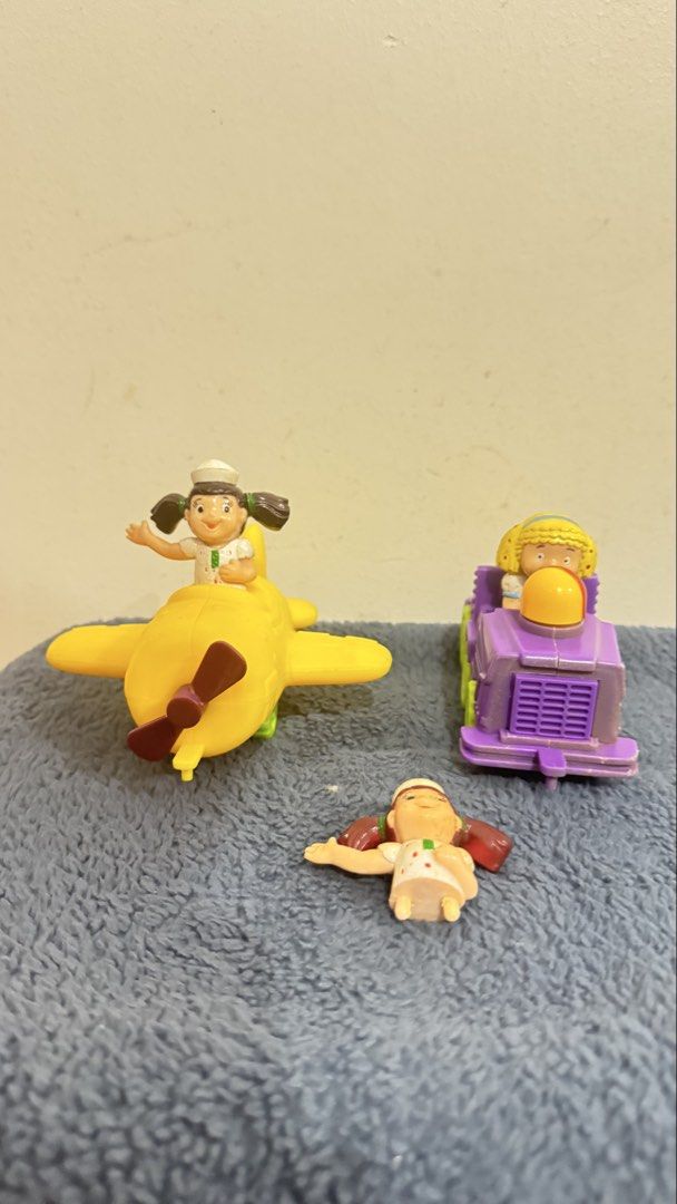 Vintage Toy Jollibee Fun flyer (Category: Kids Toys) located in Paranaque City. Submitted by pengkit (Listing ID 1434856124, Image 1). Description: - Vintage toy figure set - Includes: yellow airplane, purple vehicle, small figure - Made of plastic - Brightly colored - Airplane features a propeller - Purple vehicle has a grill - Small figure is lying down.