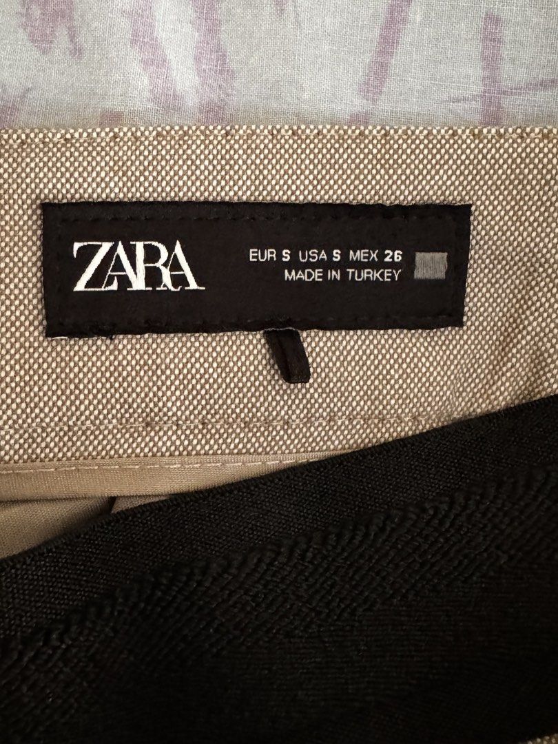 Zara Beige-Light Gray Slim Trousers (Category: Other Bottoms) located in Quezon City. Submitted by mkr888 (Listing ID 1434901392, Image 3). Description: Hi! Selling my Zara Slim trousers. It is beige-light gray ish color. Garterized back, button and clip and zipper closure. It has 2 front pockets, and 2 faux back pockets. Never been used. Only stored. Guaranteed store bought. Still in excellent condition. My price is slightly negotiable :) Paymen