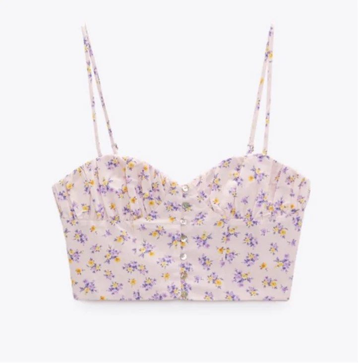 Zara Floral Crop Top (Category: Others Tops) located in Paranaque City. Submitted by preloved_archives (Listing ID 1434885542, Image 2). Description: Zara floral crop top. Size M. Features a pink, purple, and yellow floral print, sweetheart neckline, and button-down front. Made in Turkey..