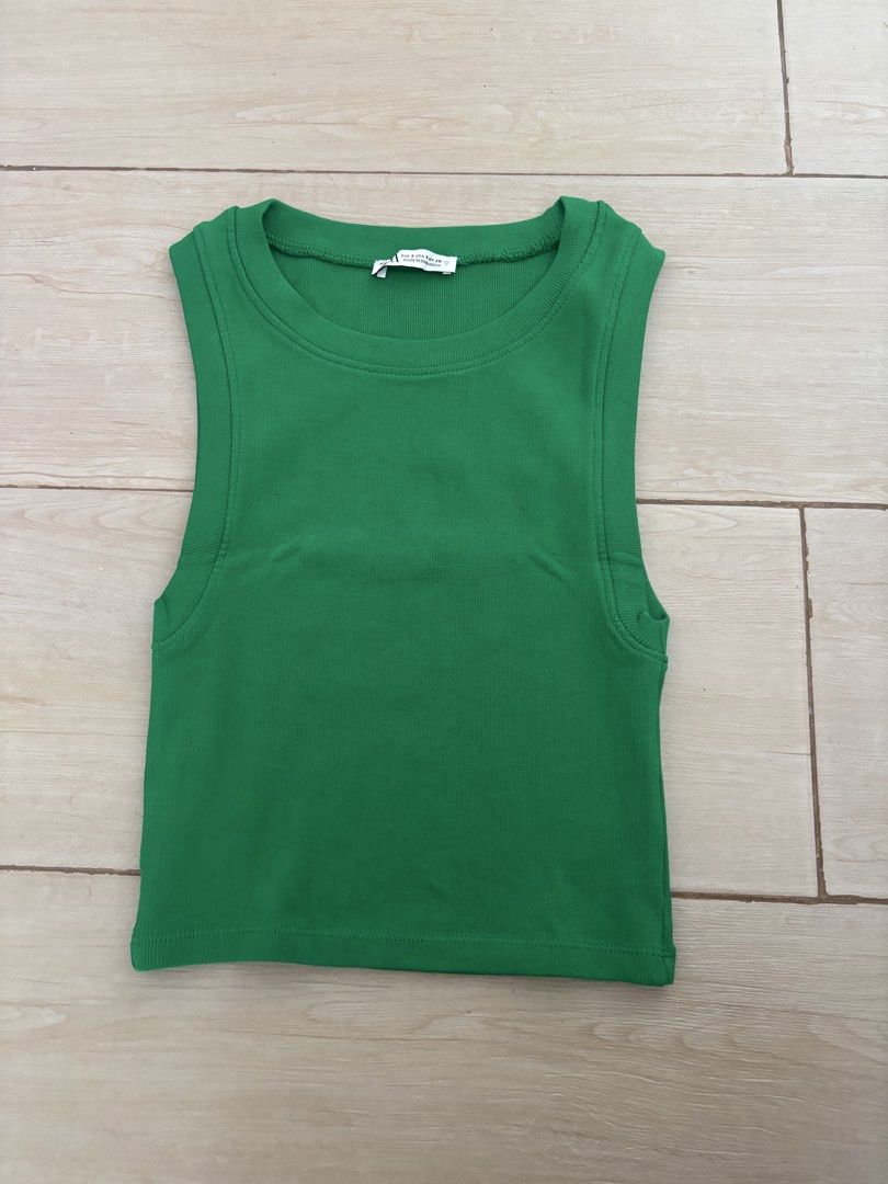 Zara Green Sleeveless Top - Size S (Category: Sleeveless) located in Paranaque City. Submitted by preloved_archives (Listing ID 1434885646, Image 1). Description: - Zara sleeveless top - Vibrant green color - Size: S - Round neckline - Fitted silhouette - Made in Bangladesh - Versatile for casual outfits.
