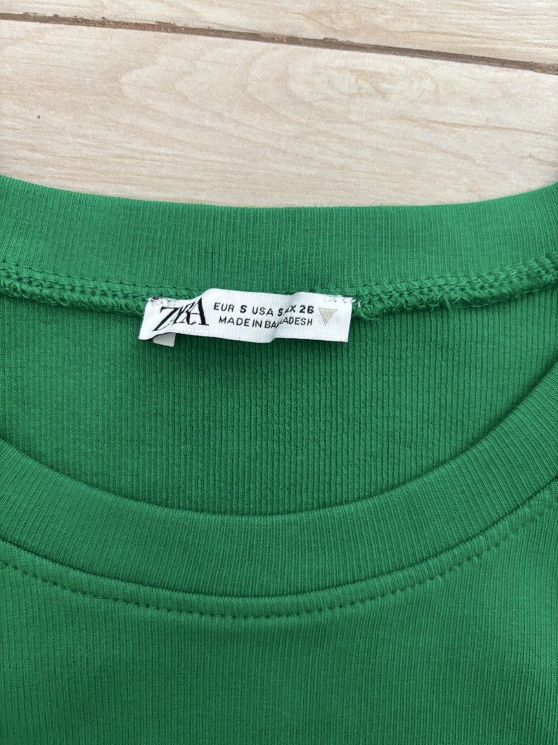 Zara Green Sleeveless Top - Size S (Category: Sleeveless) located in Paranaque City. Submitted by preloved_archives (Listing ID 1434885646, Image 2). Description: - Zara sleeveless top - Vibrant green color - Size: S - Round neckline - Fitted silhouette - Made in Bangladesh - Versatile for casual outfits.