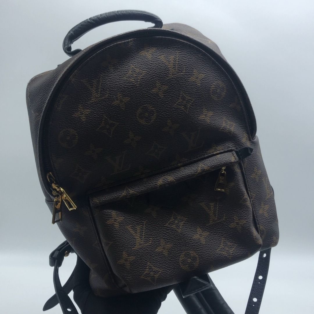 267003641 LOUIS VUITTON BAG MONOGRAM PALMSPRING PM RFID / DATE CODE (Category: Luxury Bags & Wallets) located in Taguig. Submitted by ecoring.ph (Listing ID 1435063550, Image 1). Description: ◆CONDITION: B- ◆DESCRIPTIONS: (Other defects/info:) OUTER: The body of the bag is scratched, scuffed, dirty, has peeled coating, press marks, and shows signs of use. The top handle and strap of the bag are wrinkled, scratched, scuffed, stained, dirty and hav