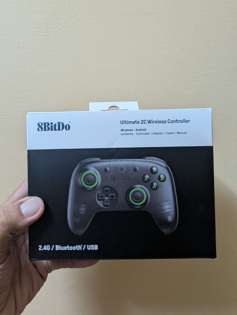 8bitdo Ultimate 2C wireless bluetooth controller (Category: Controllers) located in Quezon City. Submitted by unboxingtito (Listing ID 1435076519, Image 1). Description: Brand new and unused. Includes box, charging cable and dongle.