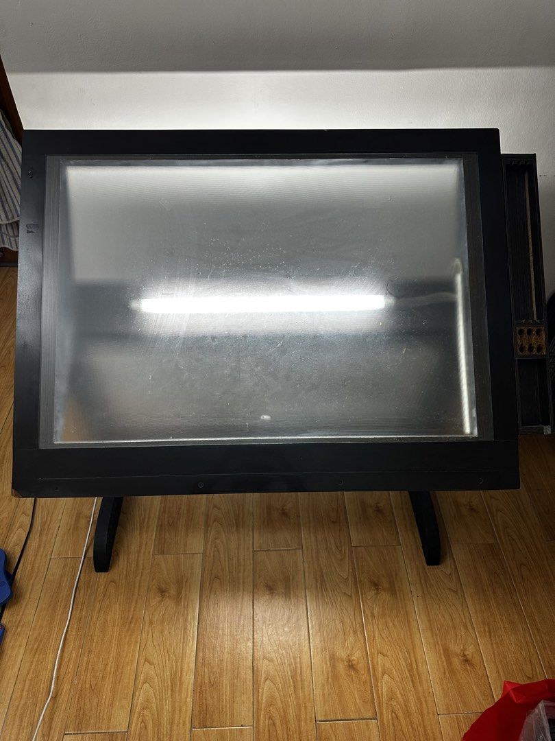 Adjustable Drafting Table with Light (Category: Tables & Sets) located in Manila. Submitted by arki_ris (Listing ID 1435013697, Image 2). Description: - Adjustable drafting table - Large, illuminated surface - Sturdy black frame - Tilting top for comfortable angles - Built-in light source - Ideal for drawing, sketching, and creative projects - Functional and practical for any studio or workspace Rfs: No longer needed, graduating. p.s. no reviews 
