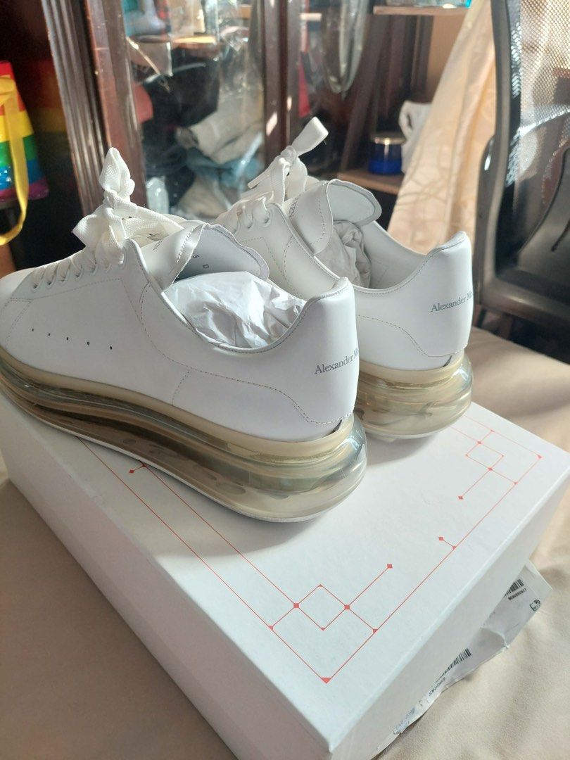 Alexander McQueen Oversized Sneakers (Category: Sneakers) located in Manila. Submitted by i-sell-stuff (Listing ID 1435071133, Image 3). Description: - Alexander McQueen sneakers - White color - Oversized soles - Unworn condition - Includes original box - Comes with white laces - Soles have a translucent, light-brown tint.