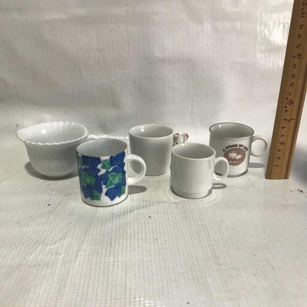 Assorted Ceramic Mini Mugs #4582 (Category: Coffee & Tea Tableware) located in Malabon City. Submitted by mldg.surplus (Listing ID 1435109422, Image 1). Description: - Set of five ceramic mugs - Includes: - White bowl-shaped mug - Mug with blue and green leaf pattern - Plain white mug - Small white mug - Mug with "A Stage of Life" print - Perfect for coffee, tea, or any beverage - Great for gifts or adding to your collection MLDG Surplus Reminder