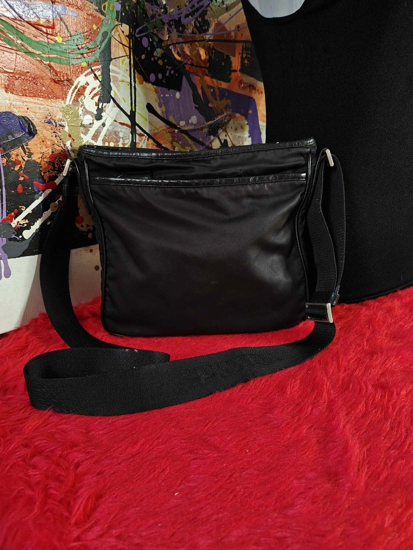 Auth Prada crossbody bag (Category: Luxury Bags & Wallets) located in Las Pinas. Submitted by anna_so2 (Listing ID 1435138314, Image 2). Description: good condition no flaws sign of used lang 🥰.