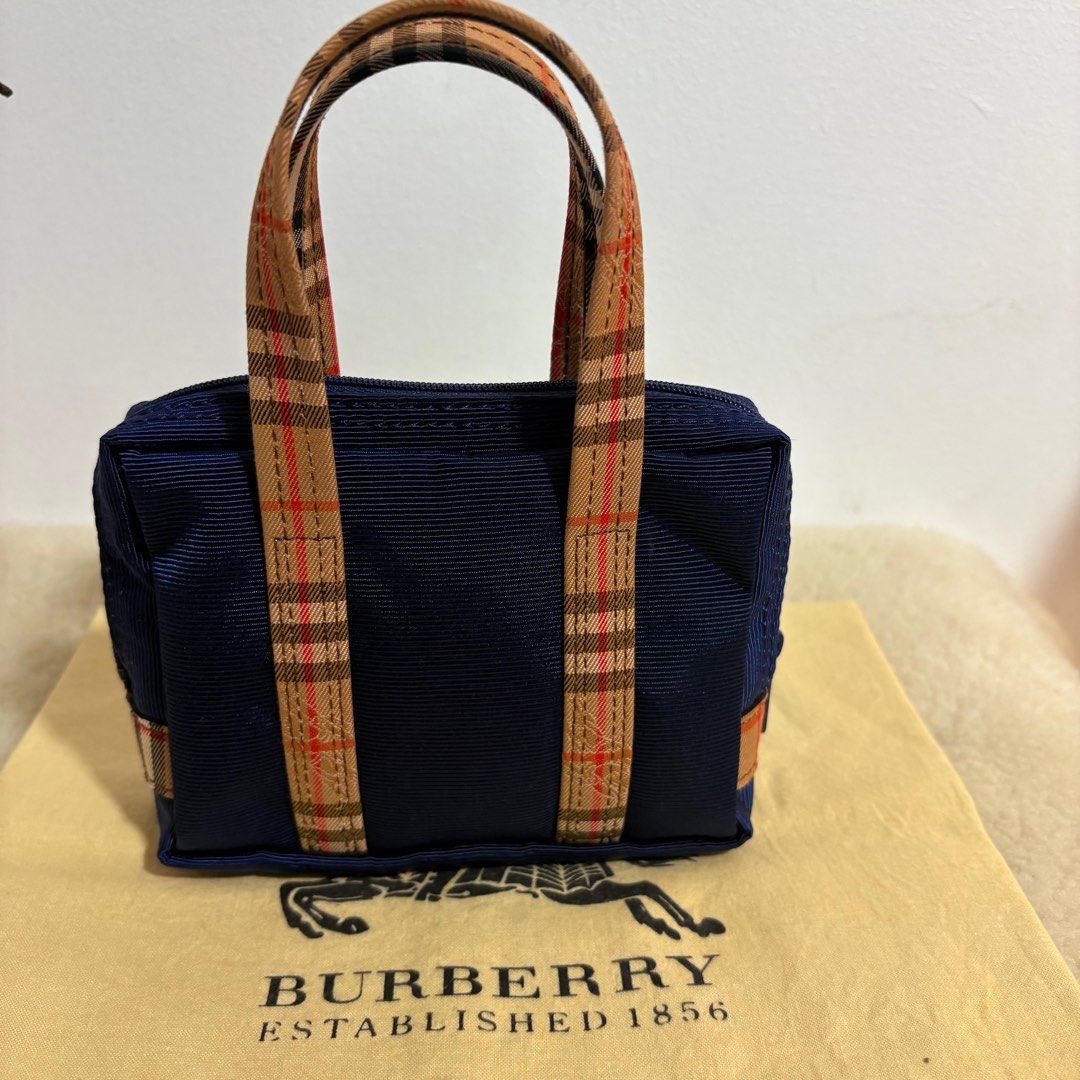 Authentic Burberry’s Japan Mini Handbag (Category: Luxury Bags & Wallets) located in Binangonan. Submitted by makoleksyon (Listing ID 1435126526, Image 3). Description: Excellent condition Like new No flaws Ykk zip kasya phone Bought in Japan 💯% Authentic Money back guarantee.