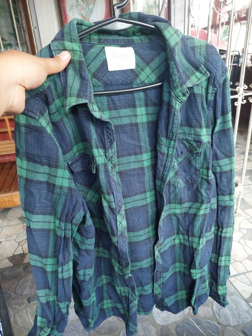 Authentic Clothing Flannel Shirt - XL (Category: Tshirts & Polo Shirts ) located in Governor Generoso. Submitted by cma_rarefitph (Listing ID 1435166672, Image 2). Description: - Authentic flannel shirt - Size: XL - Color: Green and navy plaid - Features: Button-down front, chest pocket, long sleeves - Fabric: Medium-weight flannel - Suitable for cooler weather.
