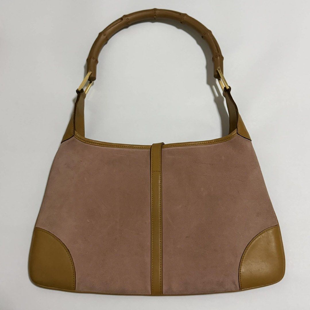 Authentic Gucci Jackie Bamboo Handle (Category: Luxury Bags & Wallets) located in Quezon City. Submitted by jhaediah (Listing ID 1368041584, Image 2). Description: Guaranteed original 💯💯💯 Bag only💓4.29 rank Ab ❗️PLEASE MANAGE YOUR EXPECTATIONS AS YOU WERE BUYING PRELOVED ITEMS. ❣️FIRST TO PAY PO TAYO SA ITEMS. As long as unpaid, it will remain available. ❌❌ no return & no exchange ❌❌.