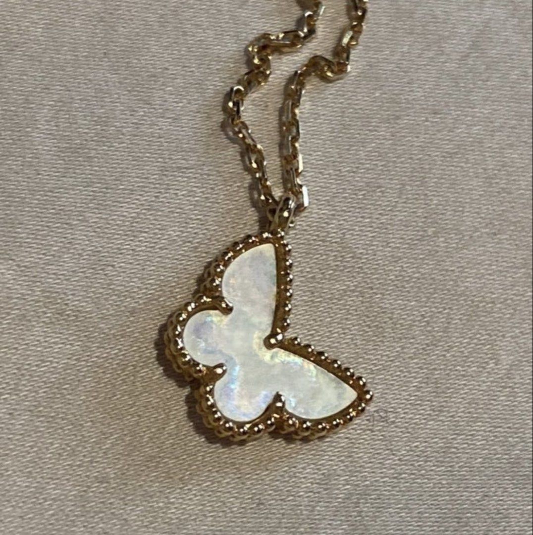 Authentic Van Cleef & Arpels Butterfly Necklace (Category: Necklaces) located in Quezon City. Submitted by shopaholicmum88 (Listing ID 1435157193, Image 3). Description: - Authentic Van Cleef & Arpels necklace - Butterfly pendant design - Features a gold chain - Mother-of-pearl inlay - Includes original box - Comes with authenticity certificate - Serial number: E088617 -AUTHENTIC OR TRIPLE MONEY BACK -MEET UP .