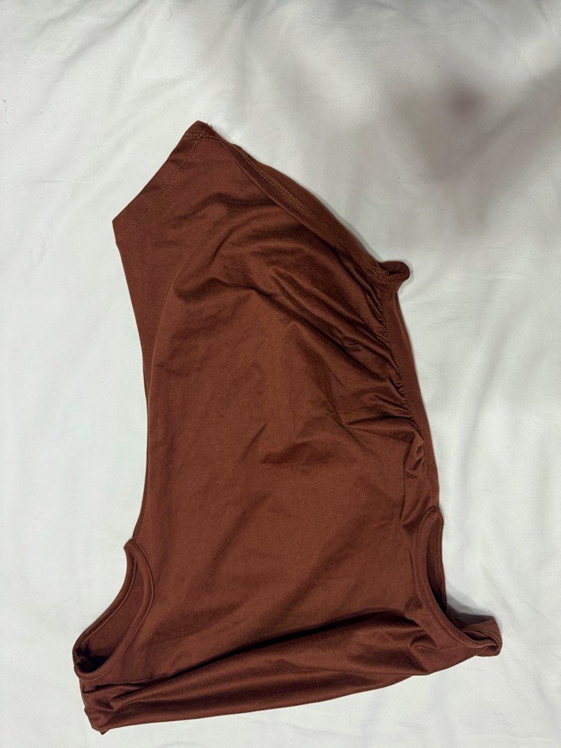 BCSO Heidi top Rust (Category: Sleeveless) located in Manila. Submitted by ysaguev (Listing ID 1435012360, Image 1). Description: - Brown sleeveless top - Round neckline - Fitted silhouette - Textured fabric - Gathered side detail - Versatile style.