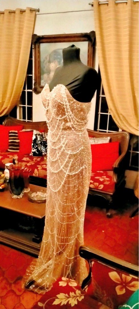 Beaded Strapless Skin Toned Evening Gown (Category: Evening dresses & gowns) located in Marikina City. Submitted by anonyg (Listing ID 1435066670, Image 2). Description: Gown worn only once. Purchased in the U.S. for $200. Medium size. Length: 59 inches (bust to floor) In very good condition, like new. Loc: QC.