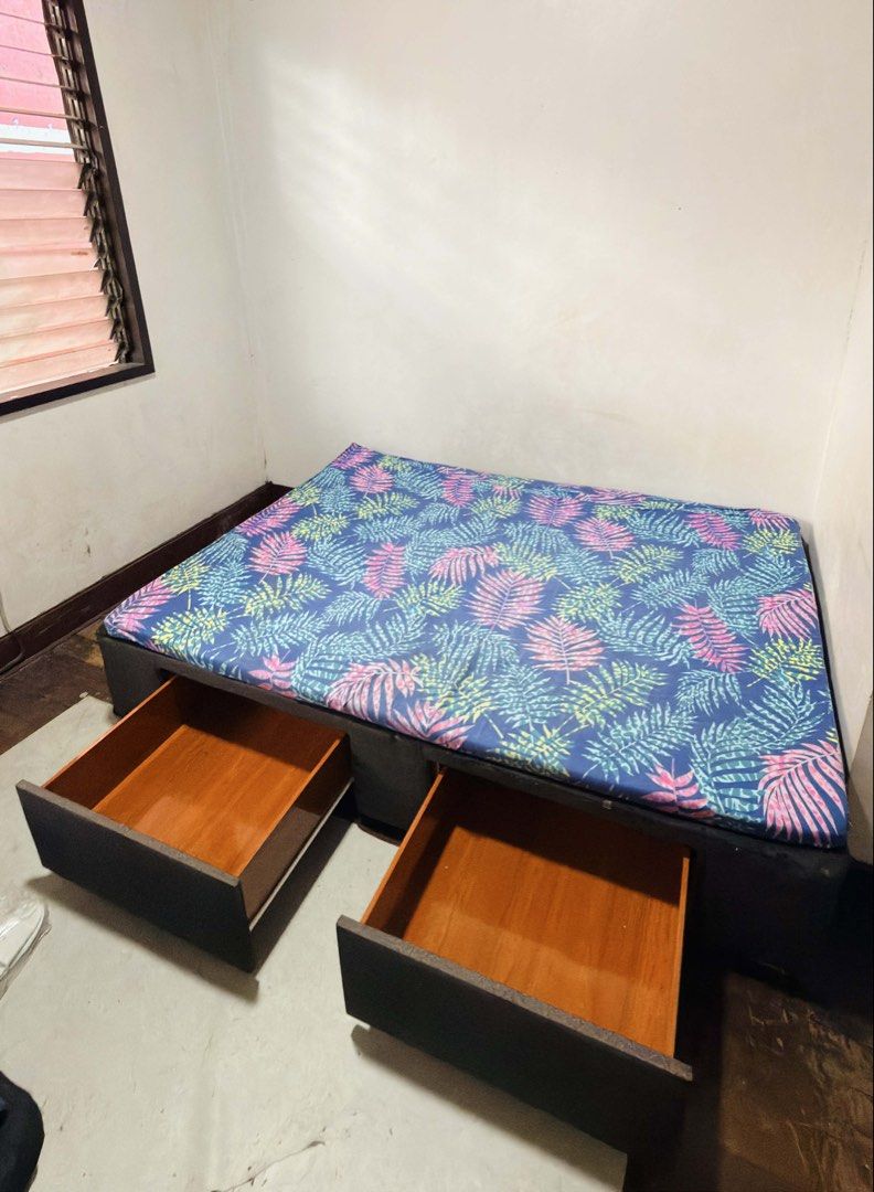Bed Frame with Storage Drawers (Category: Bed Frames & Mattresses) located in Quezon City. Submitted by davy_imperial.ocean (Listing ID 1435065511, Image 3). Description: DOUBLE SIZE BEDFRAME for SALE!!! Dimension - 54”(W) by 75”(L) with two side storage cabinet Used for 4 years but still in good condition. Foam not included but can be negotiated if interested! RFS: Moving to a condo unit. Yours at Php5,000.00 only! Available for pick-up this Apr