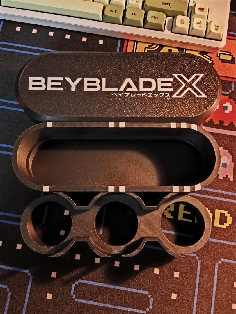 Beyblade X BeyBento Deck Box (PLEASE READ DESCRIPTION) (Category: Action & Battle Toys) located in Valenzuela. Submitted by synneste (Listing ID 1435120586, Image 3). Description: [NOTE] - None of the Beyblades are for sale. They are only for display. - This is also posted on Facebook Marketplace [Description] The deck box can hold up to 100+ double sleeved cards. It can fit small and standard sized trading cards. Made with PLA plastic. PM me for