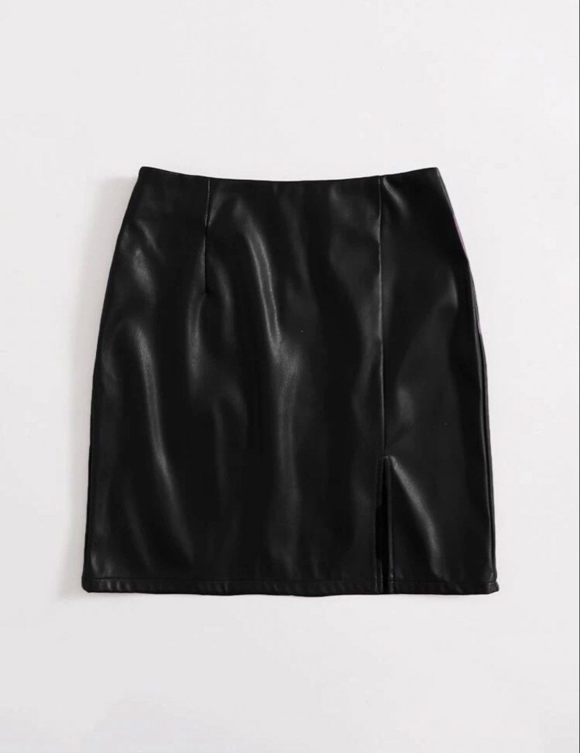 Black Leather Mini Skirt (Category: Skirts) located in Makati City. Submitted by misisellis (Listing ID 1435107330, Image 2). Description: - Black faux leather mini skirt - High-waisted design - Features a stylish front slit - Convenient back zipper closure - Perfect for various outfits - dress it up or down!.