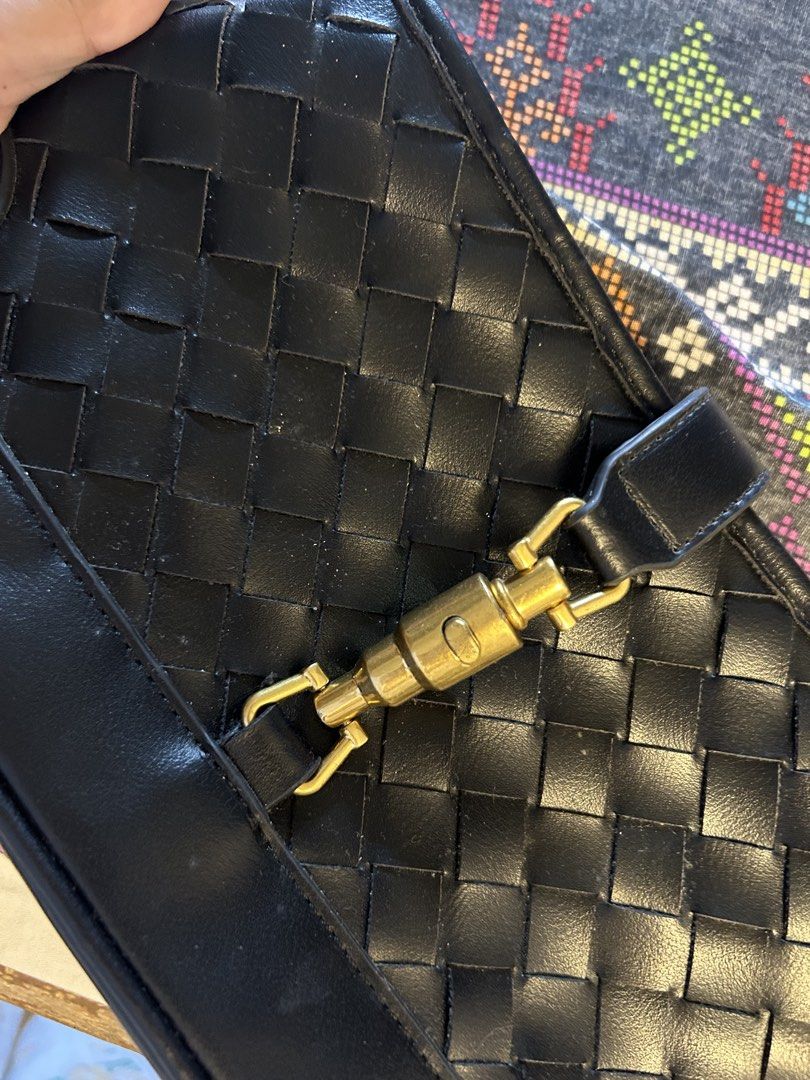 Black Shoulder and Kili Bag (Category: Shoulder Bags) located in Legazpi City. Submitted by prezeya (Listing ID 1435055019, Image 3). Description: Buy two items and receive a free gift ! 🎁 - Black shoulder bag - Woven design - Gold-colored clasp and zipper - Detachable shoulder strap - Black interior with small pocket - Made of leather or leather-like material.
