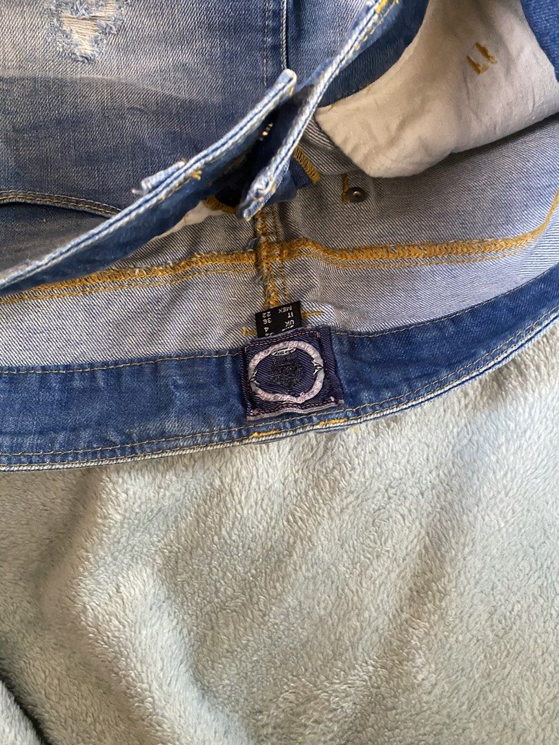 Blue Distressed Denim Mini Skirt (Category: Skirts) located in General Trias. Submitted by erssss22 (Listing ID 1435058179, Image 3). Description: - Light blue denim mini skirt - Distressed design - Button and zipper closure - Front and back pockets - Size 25-26.
