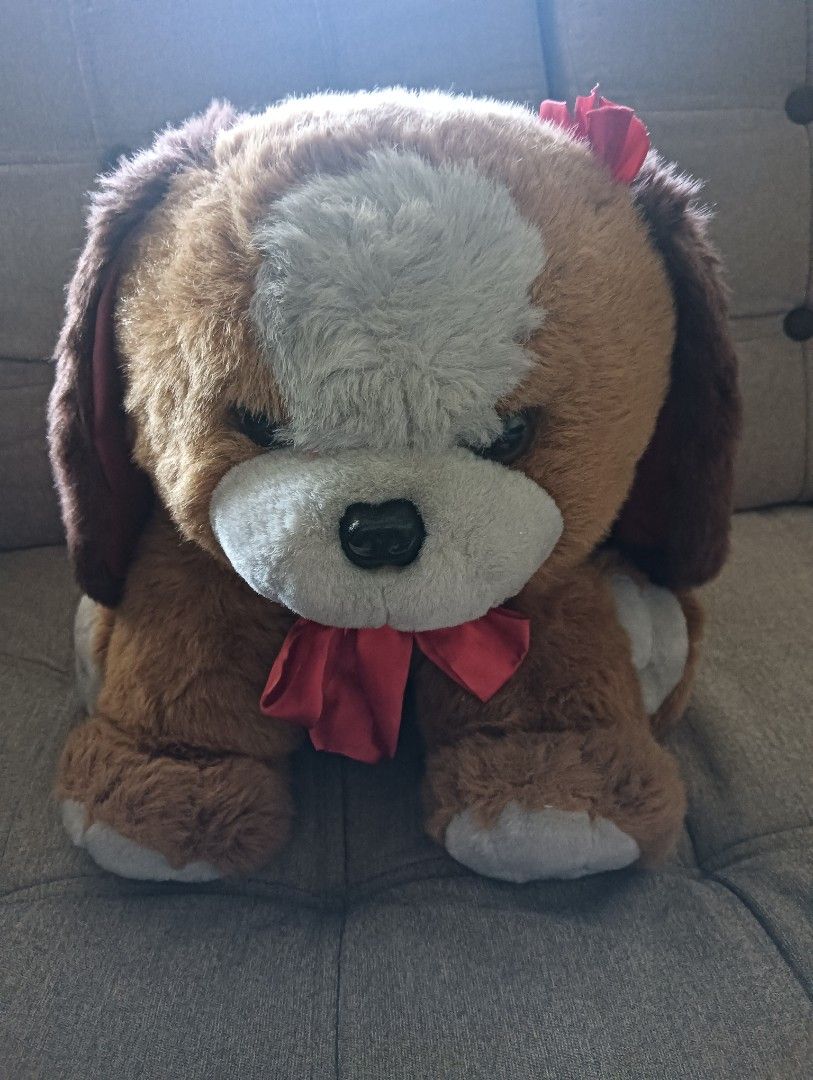 Blue Magic brand Dog Stuffed Toy (Category: Plushies & Soft Toys) located in Mandaluyong City. Submitted by ehrgeee (Listing ID 1435036584, Image 1). Description: - Adorable stuffed dog - Brown and white fur - Red bow on head and tail - Black nose - Cute expression - Approximately 49 cm / 20 inches long - Brand: Blue Magic.
