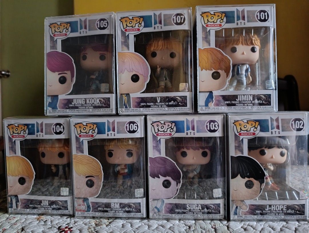 BTS Funko Pop! Vinyl Figures (Category: Toys & Games) located in Teresa. Submitted by merz09 (Listing ID 1435167924, Image 2). Description: - Considered rare since design is already vaulted - Complete set of seven BTS Funko Pop! Vinyl figures - Includes all members: - Jungkook (105) - V (107) - Jimin (101) - Jin (104) - RM (106) - Suga (103) - J-Hope (102) - Each figure is in its original box ✅All with Boss protector 👉V and JK pa lang were bough