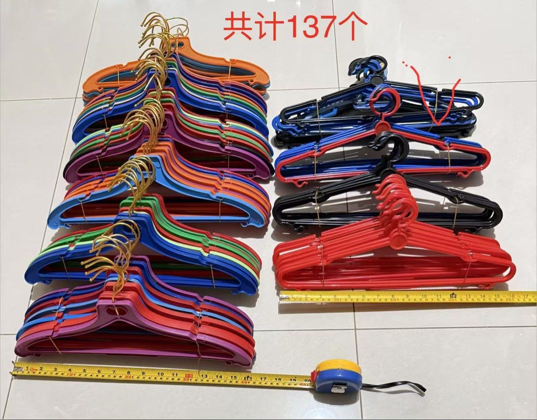 Bundle of Colorful Plastic Clothes Hangers