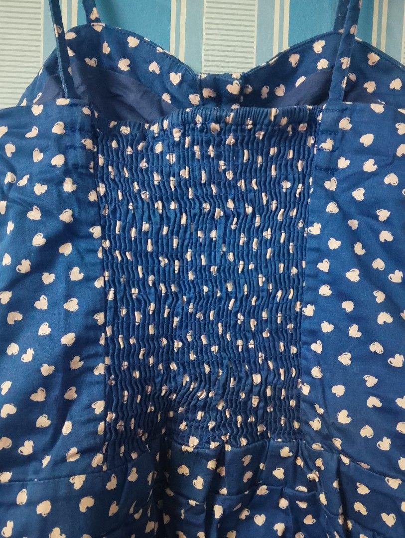 Candie's Heart Print Romper - Size S (Category: Rompers) located in Quezon City. Submitted by Ajcee (Listing ID 1435124554, Image 3). Description: - preloved Candie's romper - Adorable blue heart print - Adjustable straps - Button-down front - Comfortable smocked back panel - Small pocket with Candie's logo - Size: S needs cleaning stored in closet RFS:decluttering Gcash mode of payment sf shouldered by the buyer NO COD NO MEET UPS actual picture